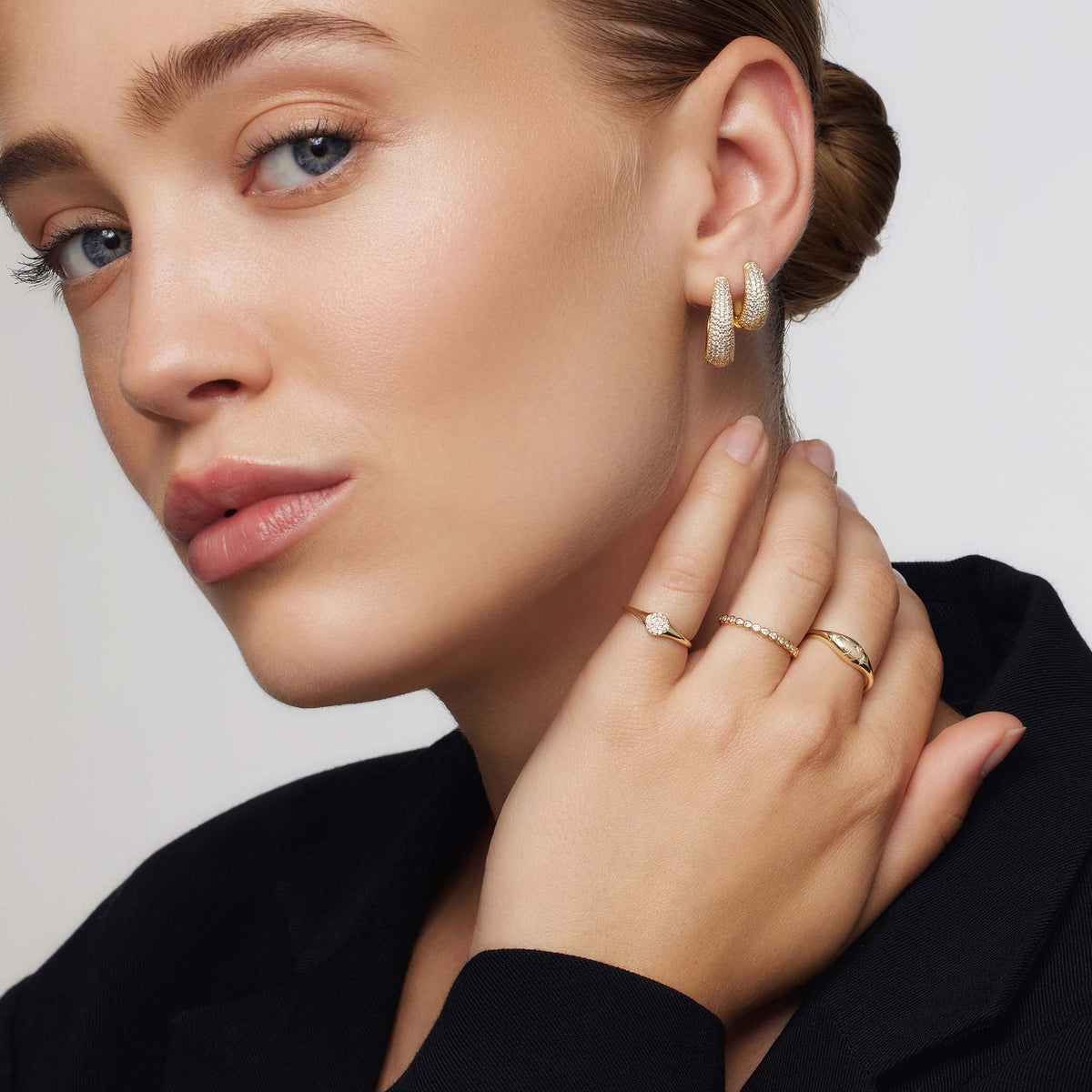 Golden ring in the shape of a diamond