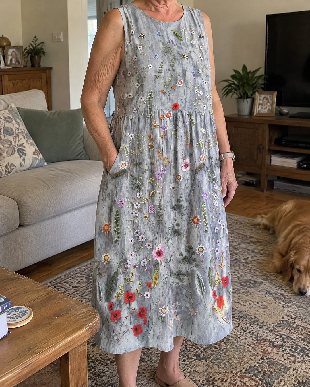 Agnes midi wildflower dress worn casually at home with hand in its side pocket