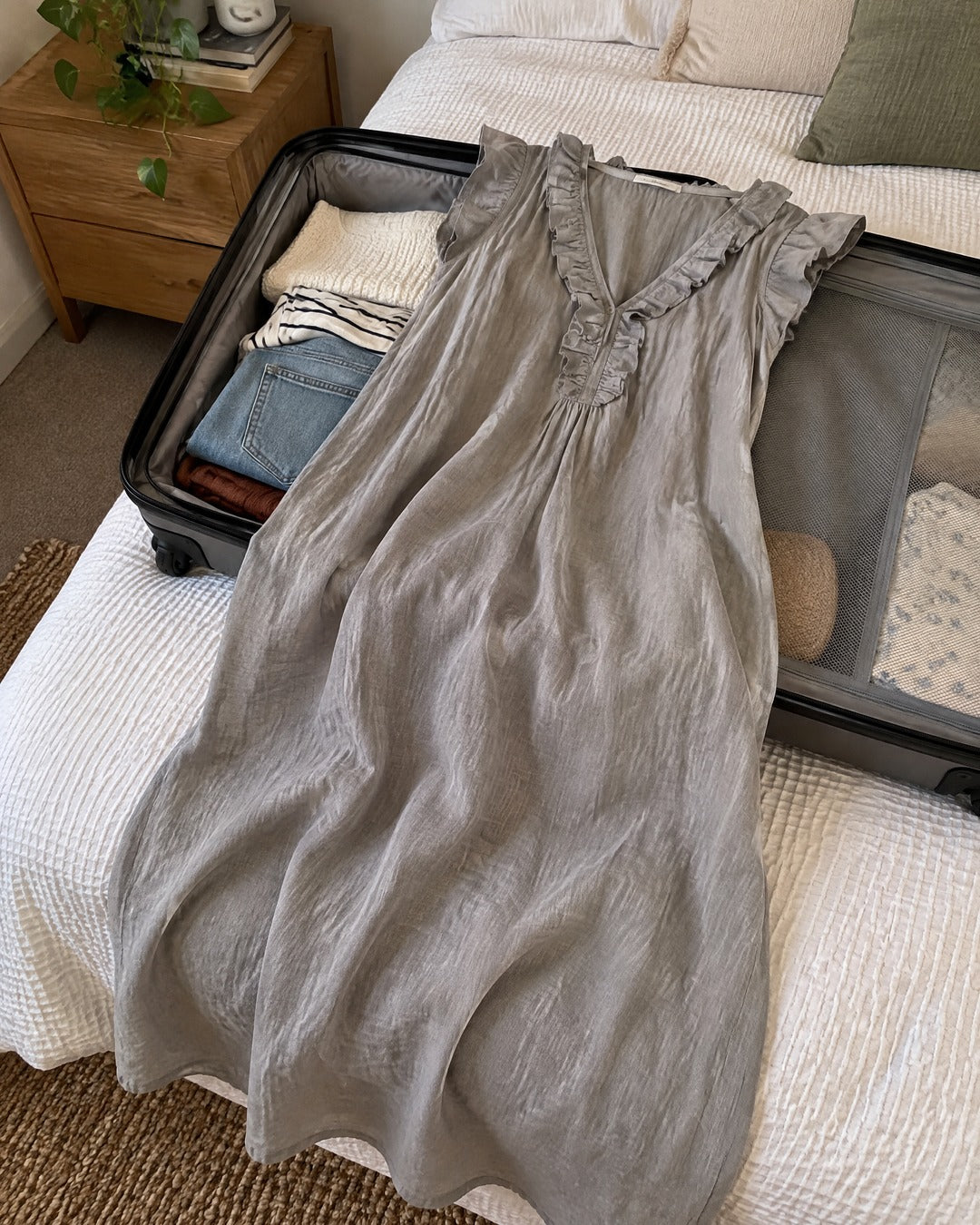 Josette grey summer dress being considered for packing a weekend bag