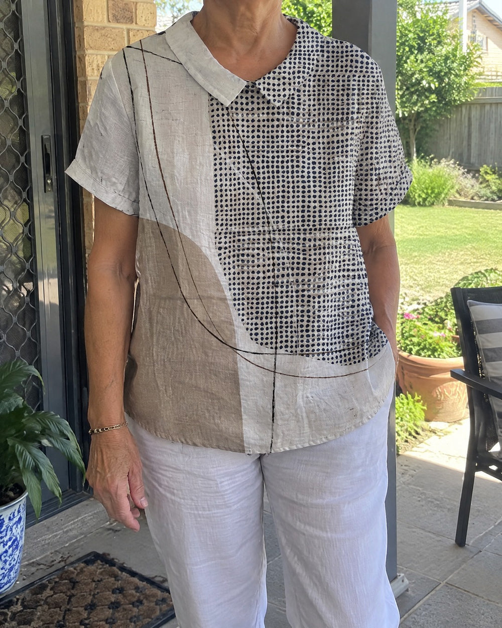 Lana abstract dots and lines shirt worn casually outdoors on verandah
