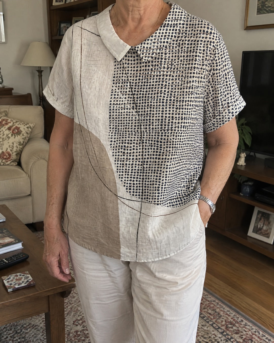 Lana abstract dots and lines shirt worn at home showing drape and rounded hem